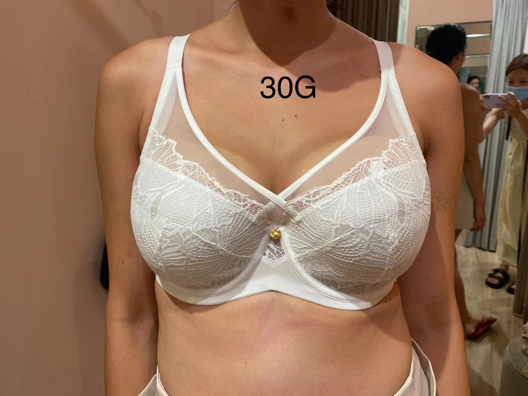 Meg wears Ivy in Cream in 30G. This is a front photo